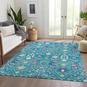 Photo of Teal Purple And Ivory Oriental Washable Area Rug With UV Protection