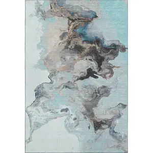Photo of Teal Silver And Beige Abstract Washable Area Rug With UV Protection
