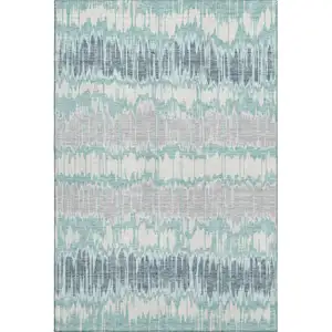 Photo of Teal Silver And Gray Striped Washable Area Rug With UV Protection