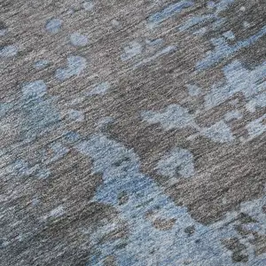 Photo of Teal Taupe And Blue Abstract Washable Area Rug With UV Protection