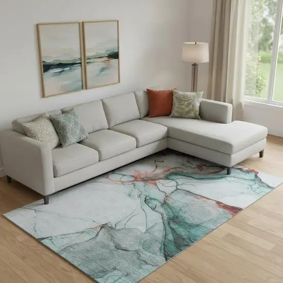 Teal Terra Cotta And Ivory Abstract Washable Area Rug With UV Protection Photo 2