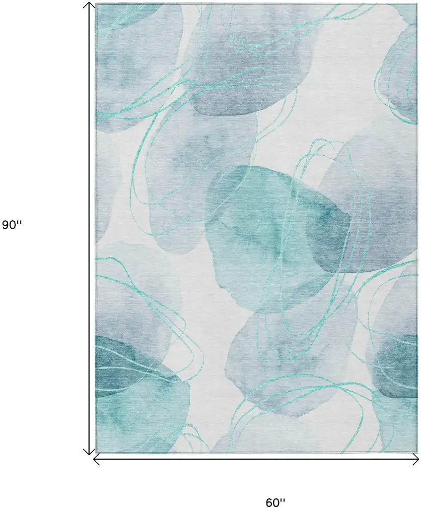 Teal and Ivory Abstract Washable Non Skid Indoor Outdoor Area Rug Photo 3