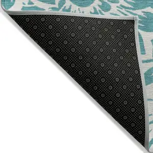 Photo of Teal and Ivory Floral Washable Non Skid Indoor Outdoor Area Rug