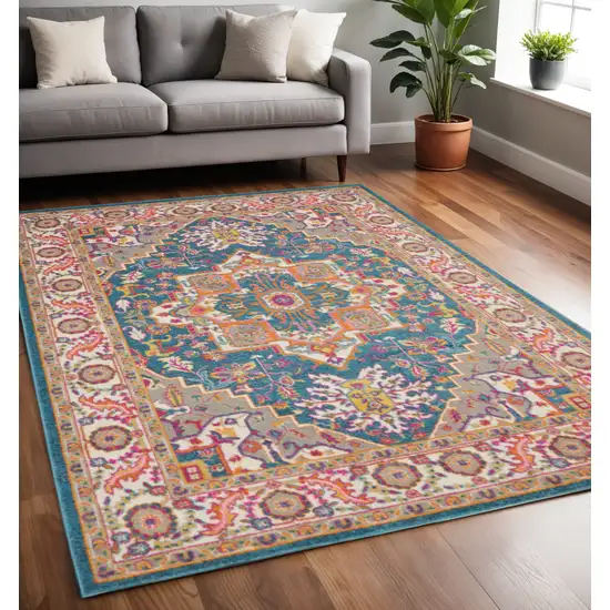 Teal And Ivory Medallion Distressed Area Rug Photo 1