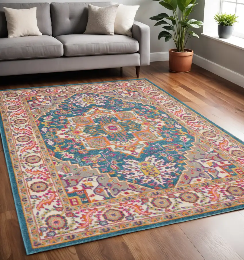 Teal And Ivory Medallion Distressed Area Rug Photo 1