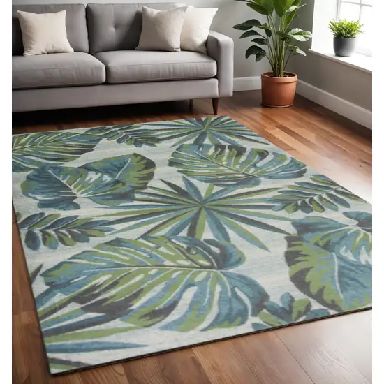 Beige Teal And Green Tropical Botanical Area Rug Photo 1