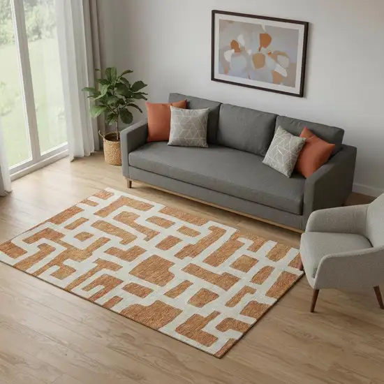 Terra Cotta And Beige Abstract Geometric Washable Area Rug With UV Protection Photo 1