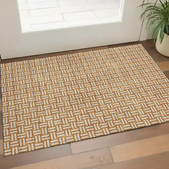 Terra Cotta And Beige Abstract Geometric Washable Area Rug With UV Protection Photo 1