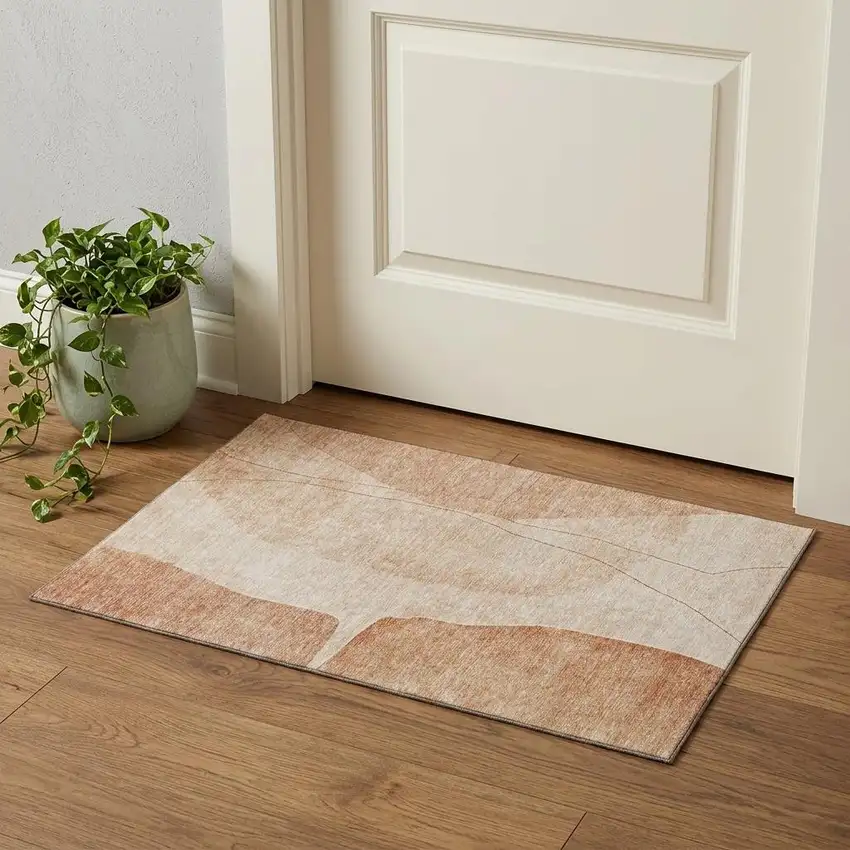 Terra Cotta And Beige Abstract Washable Area Rug With UV Protection Photo 1