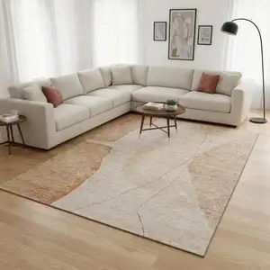 Photo of Terra Cotta And Beige Abstract Washable Area Rug With UV Protection