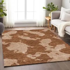 Photo of Terra Cotta And Beige Abstract Washable Area Rug With UV Protection
