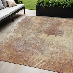 Photo of Terra Cotta And Beige Abstract Washable Indoor Outdoor Area Rug