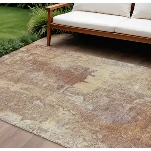 Photo of Terra Cotta And Beige Abstract Washable Indoor Outdoor Area Rug