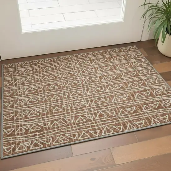 Terra Cotta And Beige Geometric Washable Area Rug With UV Protection Photo 2