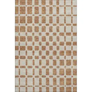 Photo of Terra Cotta And Beige Geometric Washable Area Rug With UV Protection