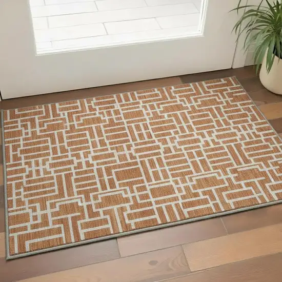Terra Cotta And Beige Geometric Washable Area Rug With UV Protection Photo 2