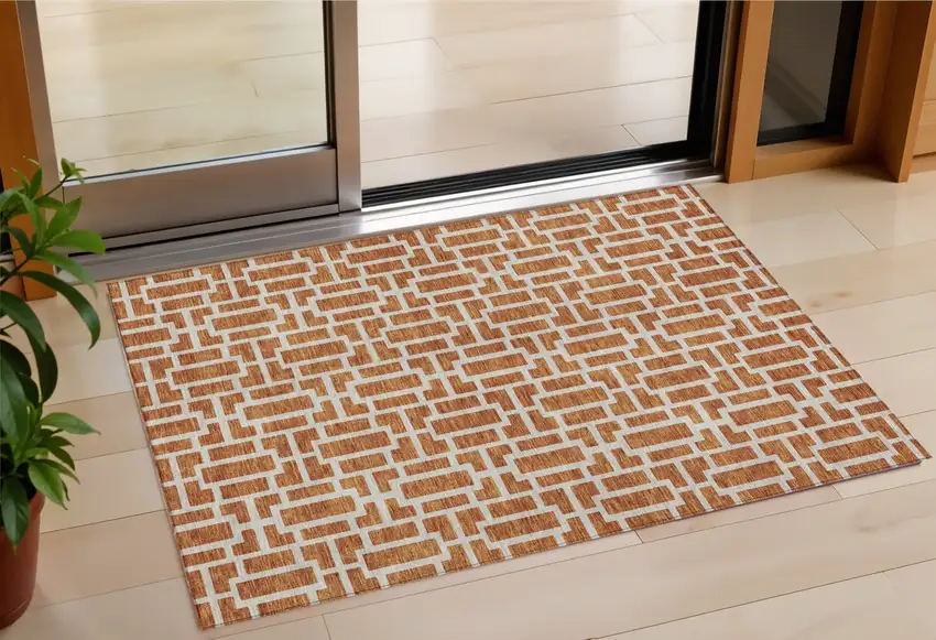 Terra Cotta And Beige Geometric Washable Indoor Outdoor Area Rug Photo 1
