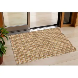 Photo of Terra Cotta And Beige Geometric Washable Indoor Outdoor Area Rug
