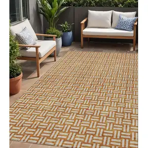 Photo of Terra Cotta And Beige Geometric Washable Indoor Outdoor Area Rug