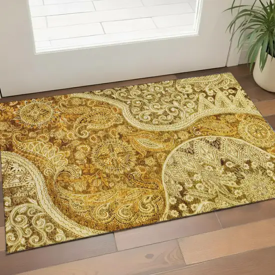Terra Cotta And Beige Paisley Washable Area Rug With UV Protection Photo 1