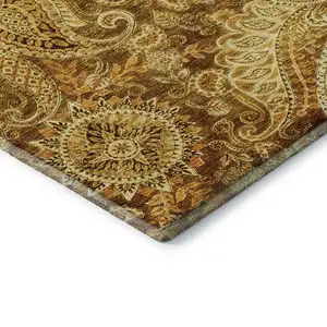 Photo of Terra Cotta And Beige Paisley Washable Area Rug With UV Protection