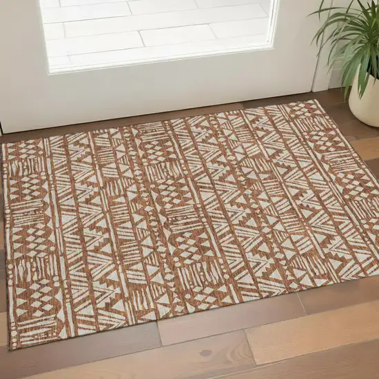 Terra Cotta And Beige Southwestern Washable Area Rug With UV Protection Photo 1