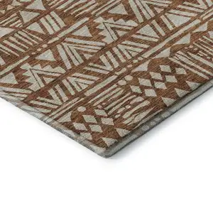 Photo of Terra Cotta And Beige Southwestern Washable Area Rug With UV Protection