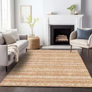 Photo of Terra Cotta And Beige Southwestern Washable Indoor Outdoor Area Rug