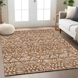 Photo of Terra Cotta And Beige Southwestern Washable Indoor Outdoor Area Rug