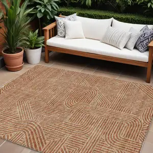 Photo of Terra Cotta And Brown Abstract Washable Indoor Outdoor Area Rug