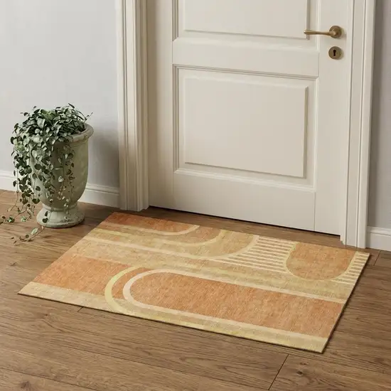 Terra Cotta And Gold Geometric Washable Area Rug With UV Protection Photo 1