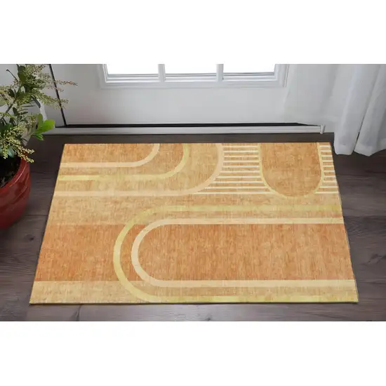 Terra Cotta And Gold Geometric Washable Area Rug With UV Protection Photo 2