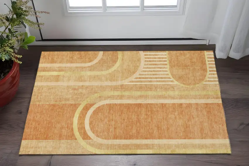 Terra Cotta And Gold Geometric Washable Area Rug With UV Protection Photo 2