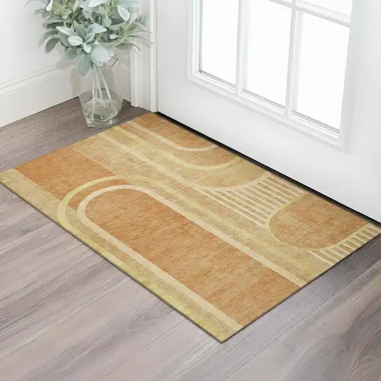 Terra Cotta And Gold Geometric Washable Area Rug With UV Protection Photo 1