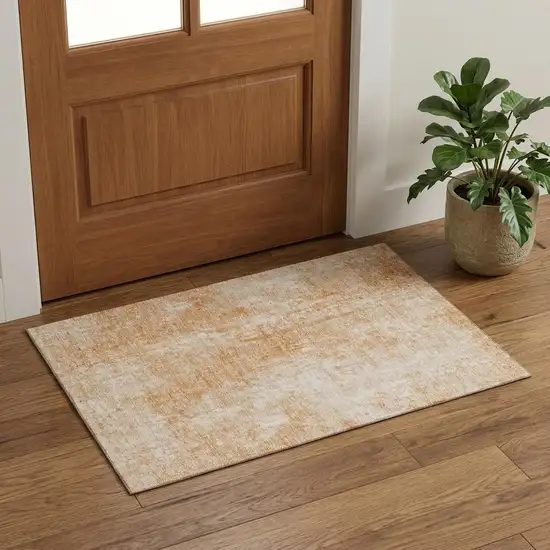 Terra Cotta And Ivory Abstract Washable Area Rug With UV Protection Photo 1