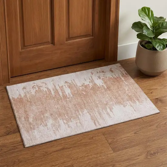 Terra Cotta And Ivory Abstract Washable Area Rug With UV Protection Photo 1
