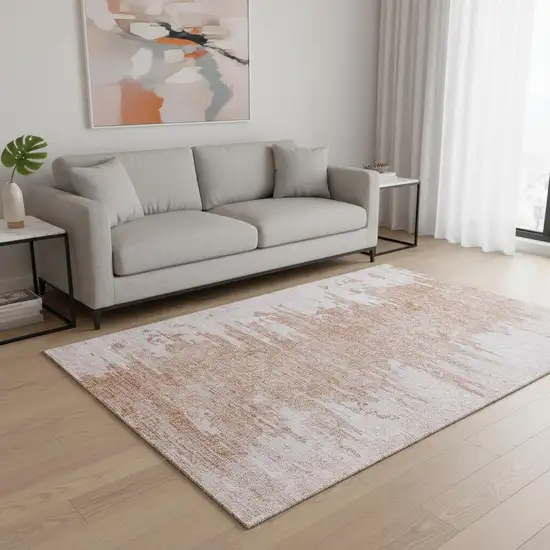 Terra Cotta And Ivory Abstract Washable Area Rug With UV Protection Photo 1