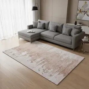 Photo of Terra Cotta And Ivory Abstract Washable Area Rug With UV Protection