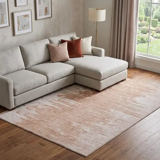 Terra Cotta And Ivory Abstract Washable Area Rug With UV Protection Photo 1