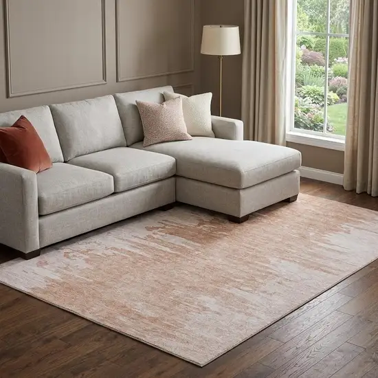 Terra Cotta And Ivory Abstract Washable Area Rug With UV Protection Photo 1