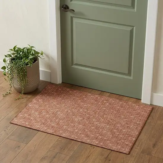Terra Cotta And Ivory Geometric Washable Area Rug With UV Protection Photo 1