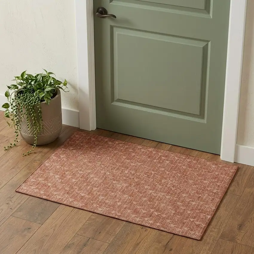 Terra Cotta And Ivory Geometric Washable Area Rug With UV Protection Photo 1