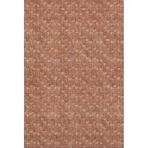 Photo of Terra Cotta And Ivory Geometric Washable Area Rug With UV Protection