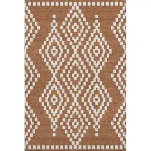 Photo of Terra Cotta And Ivory Geometric Washable Area Rug With UV Protection