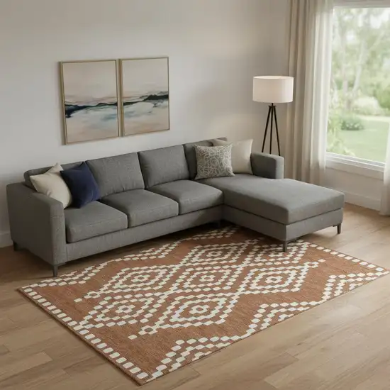 Terra Cotta And Ivory Geometric Washable Area Rug With UV Protection Photo 1