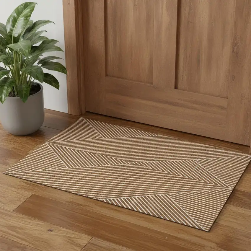 Terra Cotta And Ivory Geometric Washable Area Rug With UV Protection Photo 2