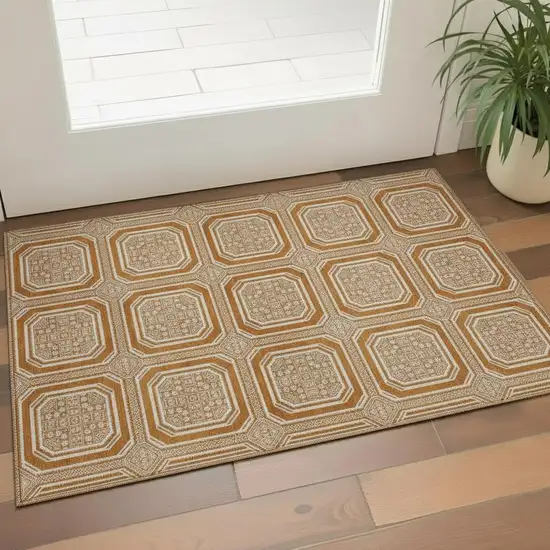 Terra Cotta And Ivory Geometric Washable Area Rug With UV Protection Photo 2