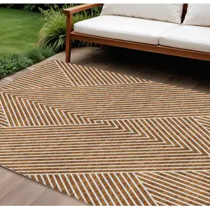 Photo of Terra Cotta And Ivory Geometric Washable Indoor Outdoor Area Rug