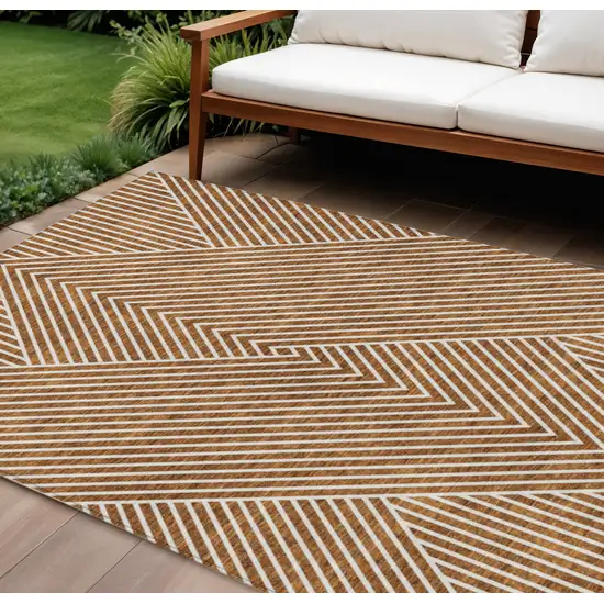 Terra Cotta And Ivory Geometric Washable Indoor Outdoor Area Rug Photo 1