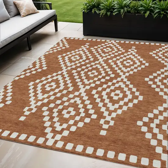 Terra Cotta And Ivory Geometric Washable Indoor Outdoor Area Rug Photo 1